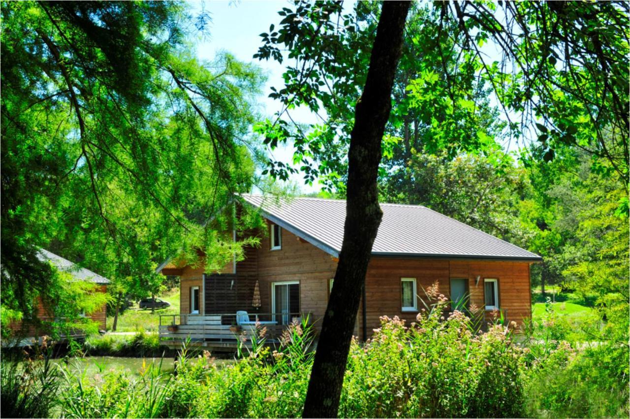 Residence Goelia Les Cottages Du Lac Coly Exterior photo